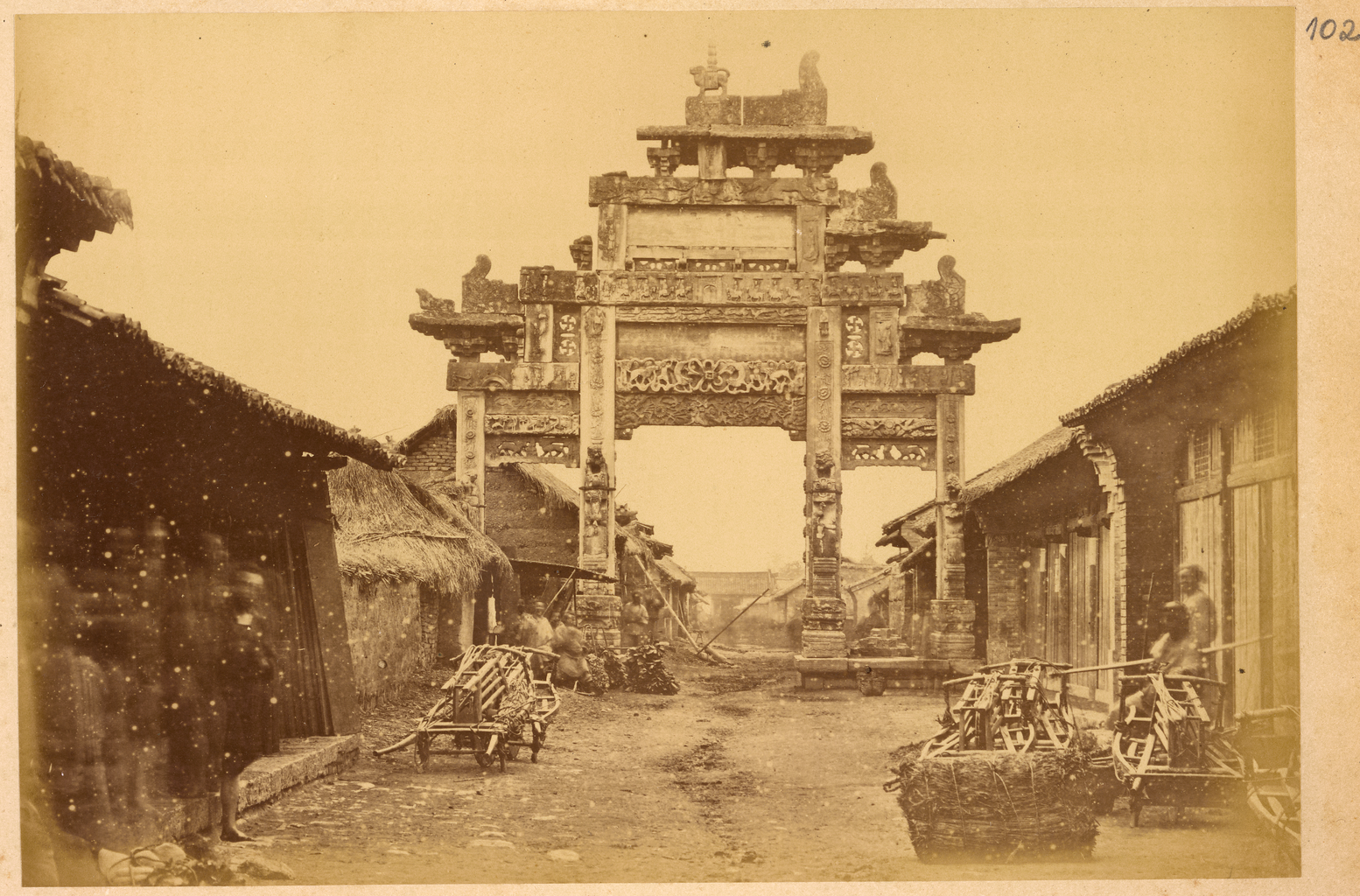 27 Ornamental Gateway Pailou from Han Dynasty 202 BCE 220 CE across a Street Lined with Small Shops Hanzhong Shaanxi Province China 1875 WDL2092